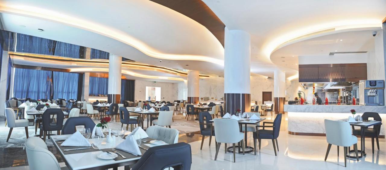 Royal M Al Aqah Beach Resort By Gewan Exterior photo The restaurant