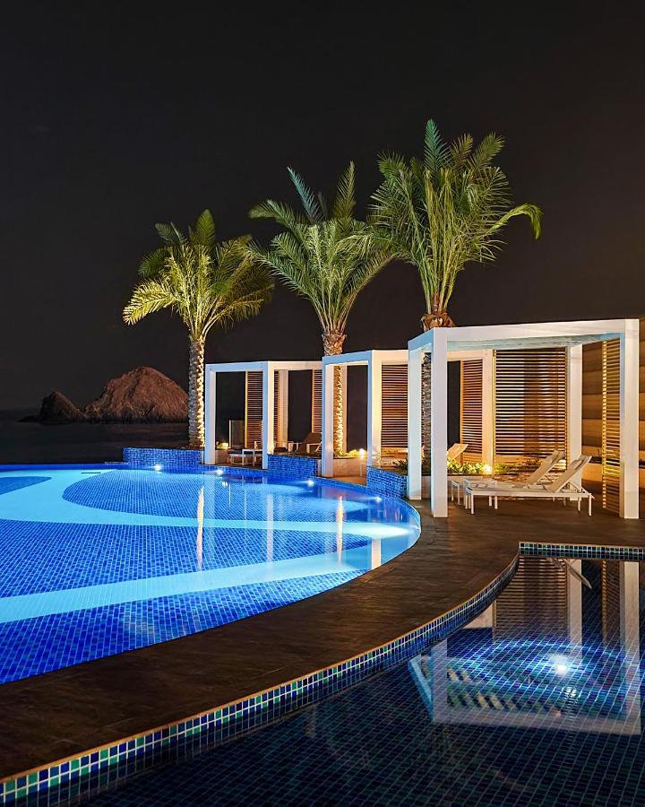 Royal M Al Aqah Beach Resort By Gewan Exterior photo The pool at the Westin Abu Dhabi