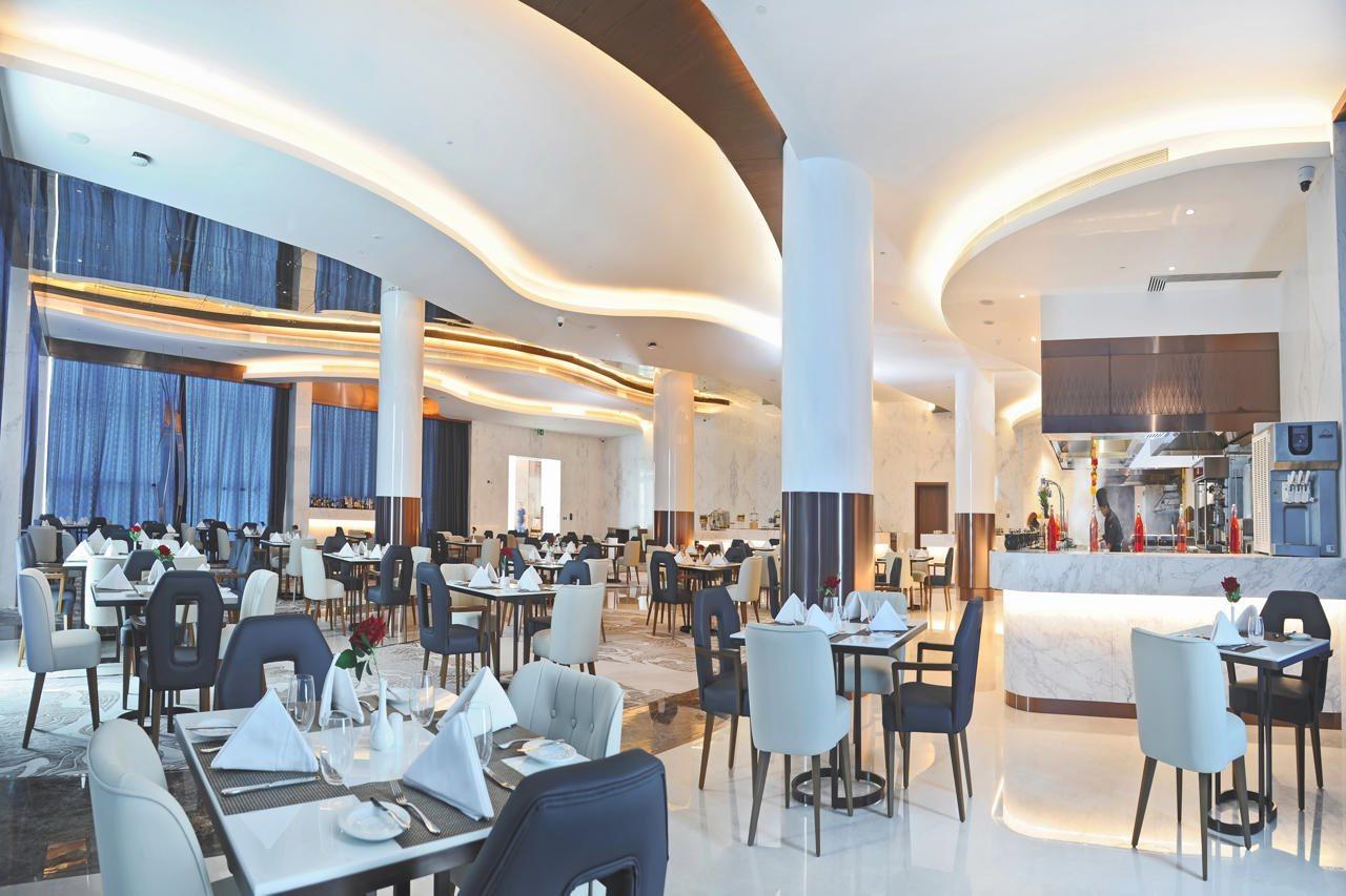 Royal M Al Aqah Beach Resort By Gewan Exterior photo The restaurant